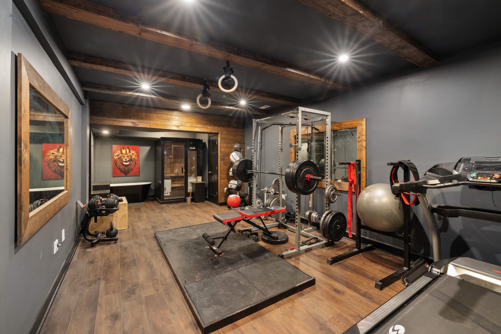 A treadmill and free weights in a home gym, the heaviest thing in most spare rooms